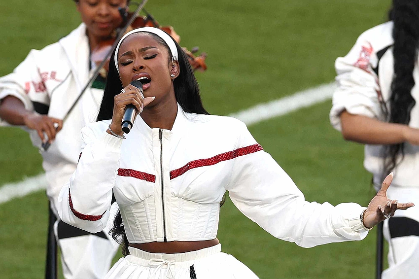 Coco Jones Shines with Black National Anthem at Super Bowl LX in Pan-African Jacket