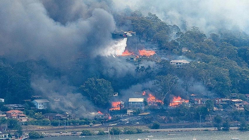Wildfires devastate NSW coast as homes burn near Sydney