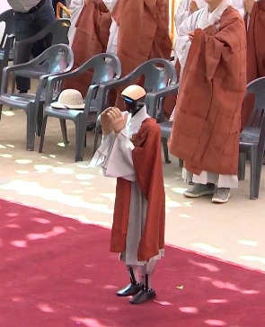 AI-Powered Monk ‘Gabi’ Takes Buddhist Vows In South Korea