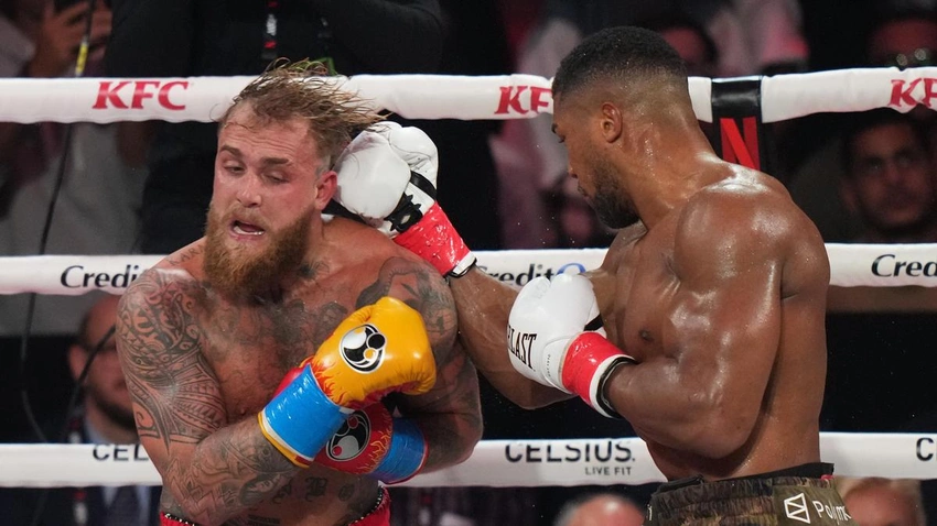Joshua Stops Paul in Six: Dominant Miami Victory