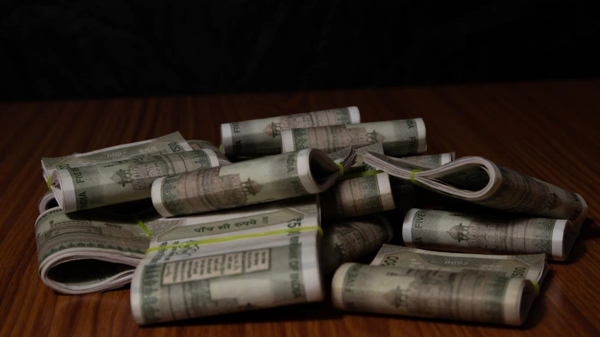 Rupee Hits New Low, Slides to 91.20 per US Dollar
