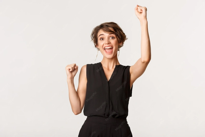 Woman celebrating success, powerful gesture, dynamic