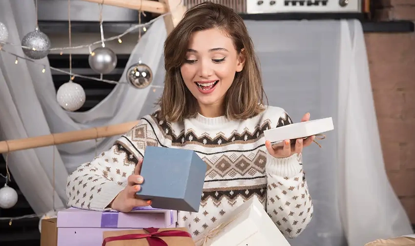 Excited person holding new hobby kit