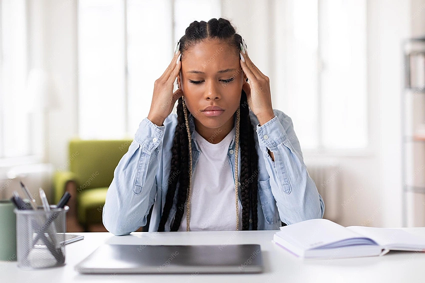 Teenager feeling overwhelmed by commitments