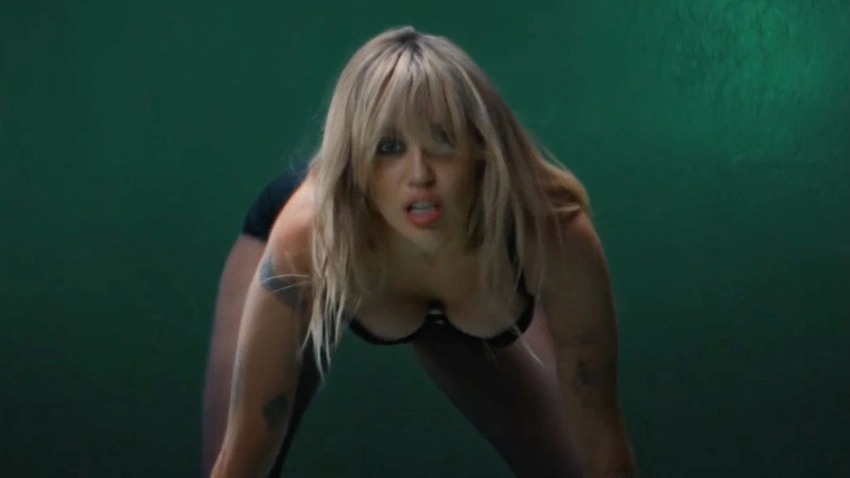 Miley Cyrus Drops "Bass Persuades" & New Album: A Pop-Synth Revival!