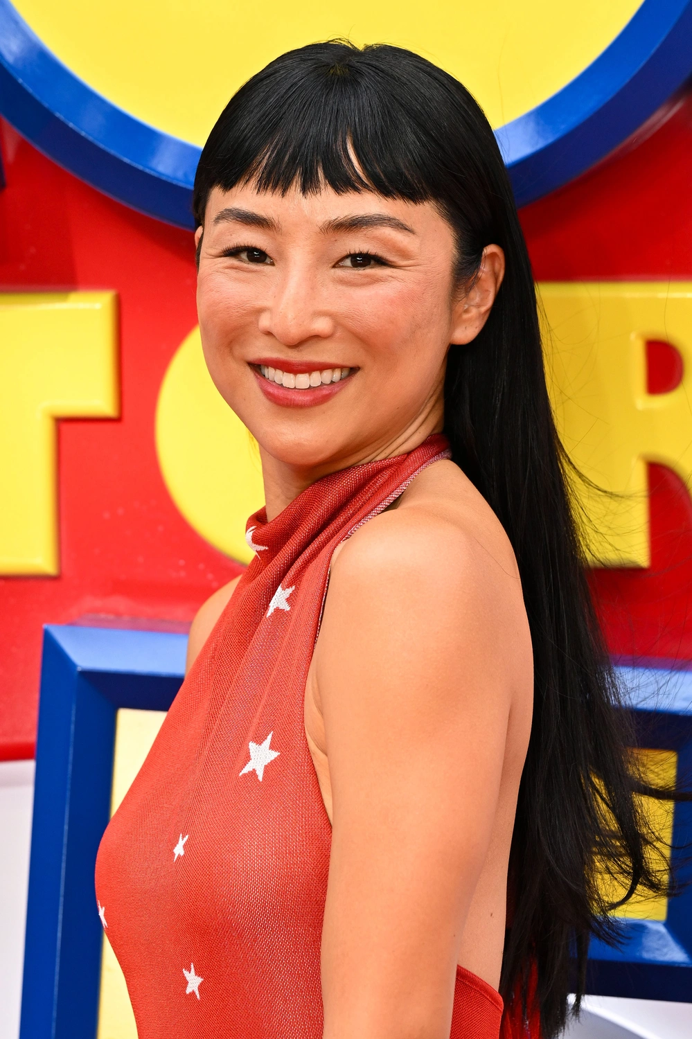Greta Lee Kicks Off Toy Story 5 Press Tour With a Chic New Look