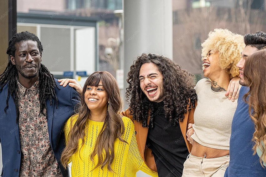 diverse group of friends with unique fashion styles laughing