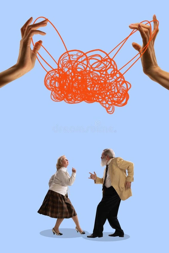 Confused couple looking at a tangled ball of string