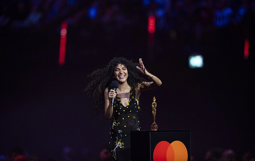 Olivia Dean crowned UK queen of pop at Brit Awards in Manchester