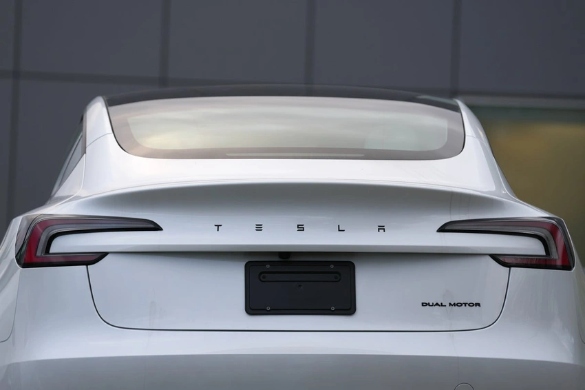 Tesla's Profit Dip: Sales Up, But R&D & Price Cuts Hit Hard