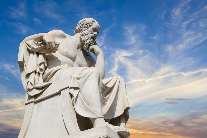 Socrates statue against modern tech background, thought-provoking