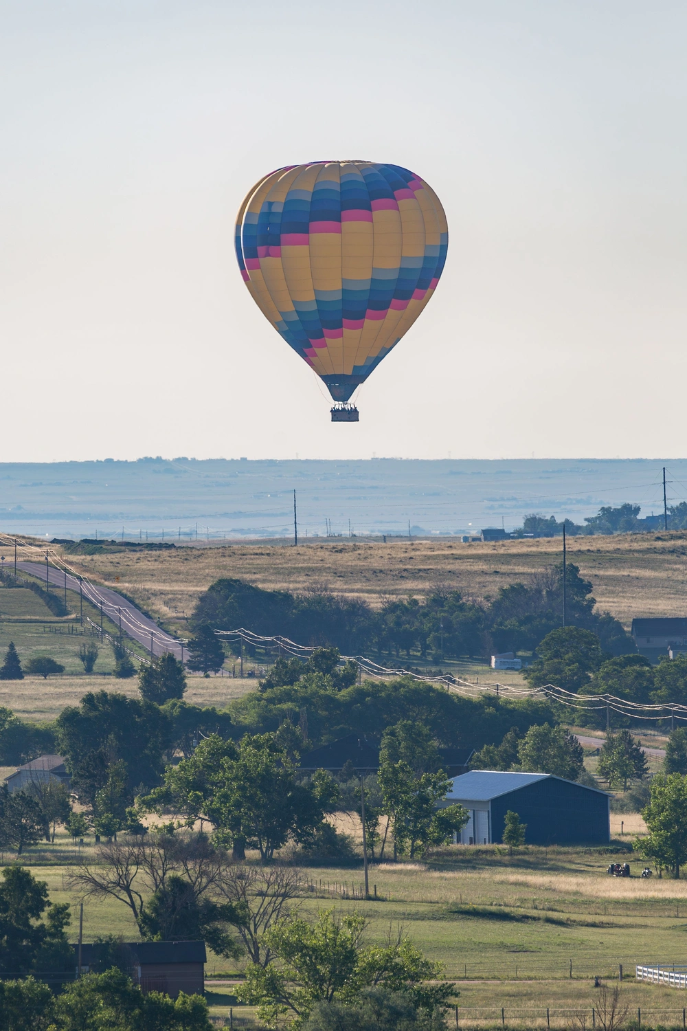 Hot air balloon with 13 aboard makes emergency landing in California backyard