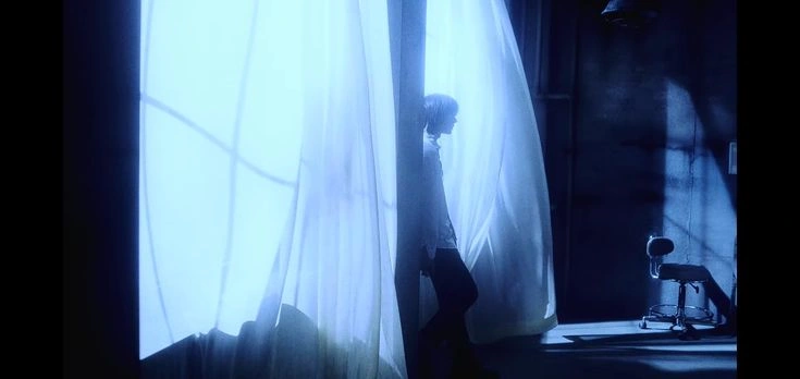 Melancholy blue aesthetic film still