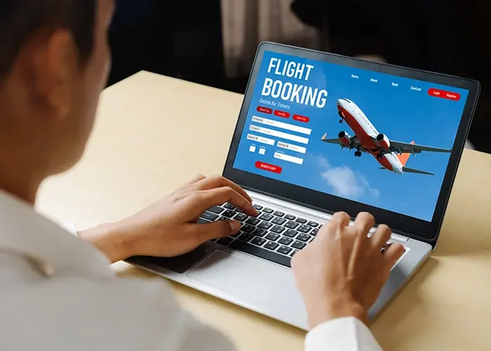 Person spontaneously booking a flight online