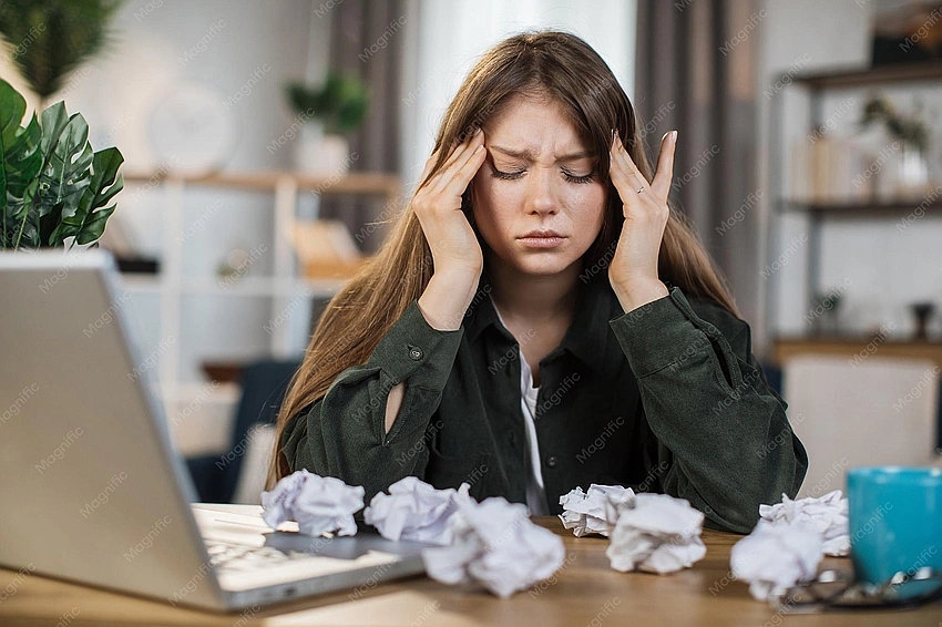 person stressed at home after work
