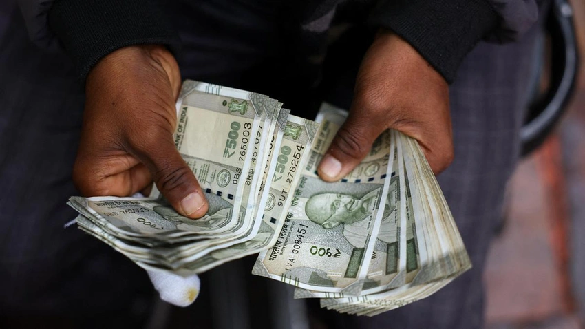 Rupee slips 11 paise to 90.77 as India-US framework weighs on markets