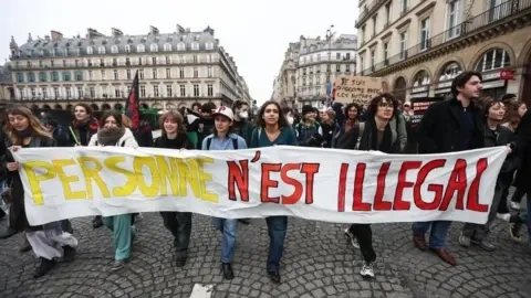 France Bans 10 British Anti-Migrant Activists