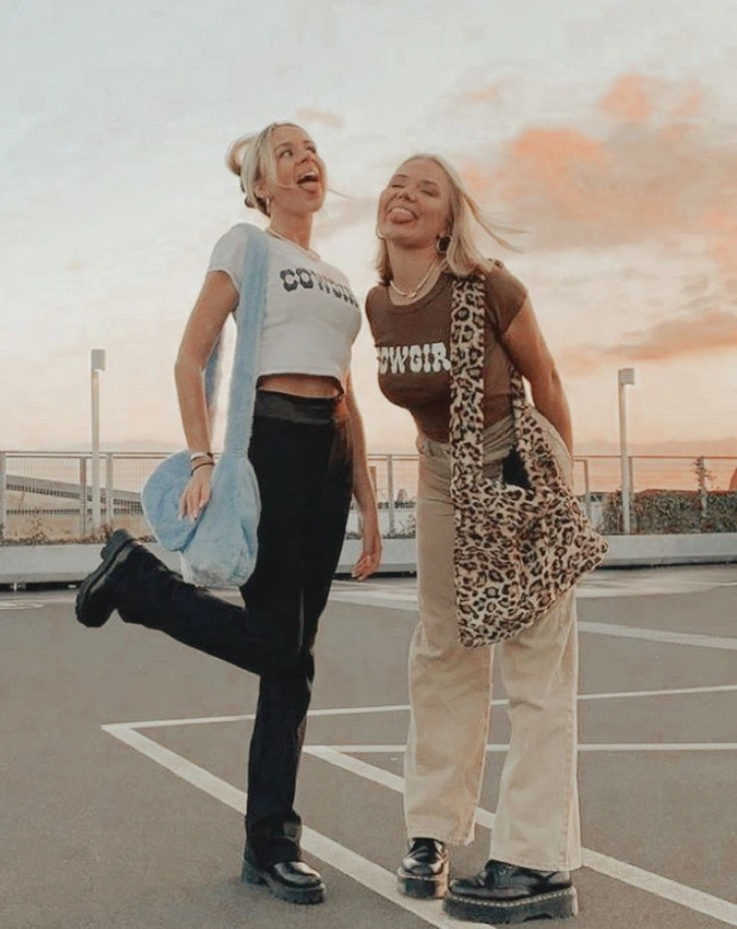two best friends laughing street style matching aesthetics