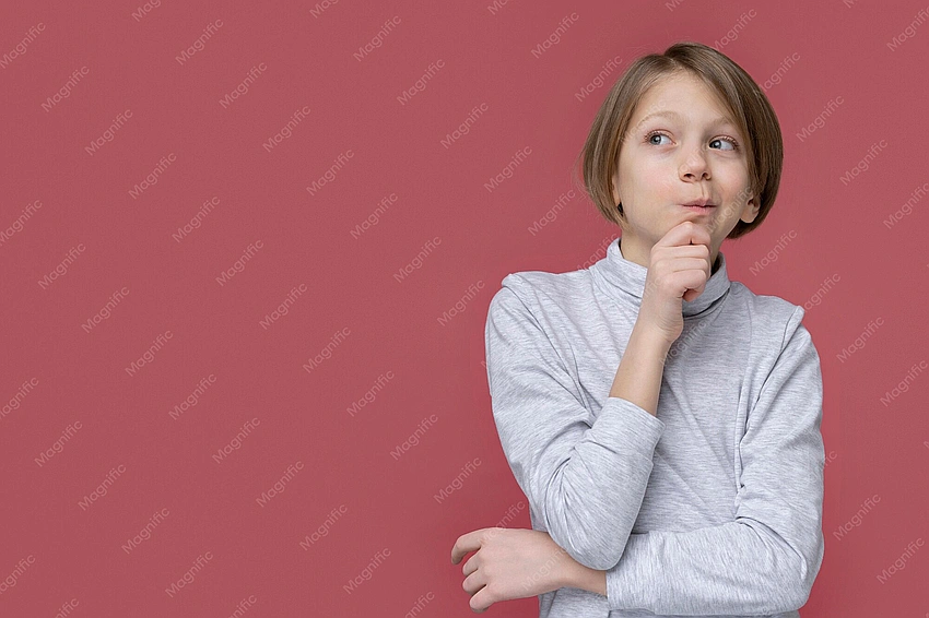 Teenager looking thoughtfully, determined expression