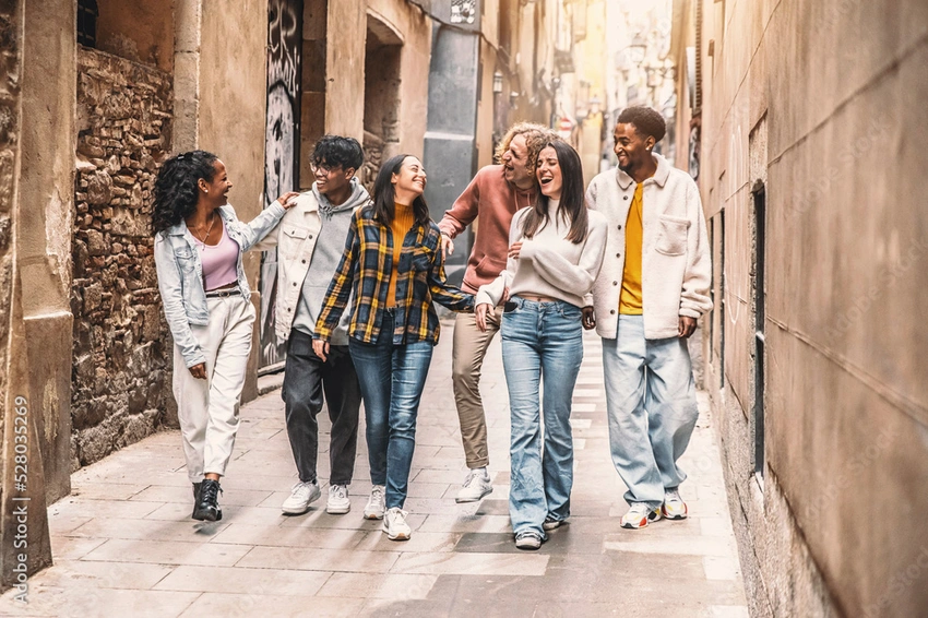 Young woman confidently walking down a street, looking happy
Cover image search term: Young diverse group of teenagers laughing in a vibrant outdoor setting, Pexels photo.
