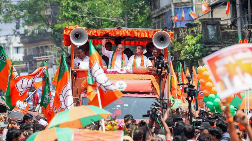 Viral video prompts row as EC official seen with BJP material in Kolkata