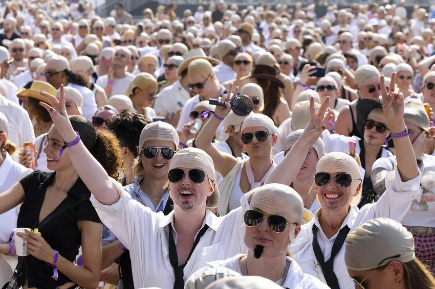 Mr. Worldwide Makes History: Pitbull Fans Set Bald Cap World Record!