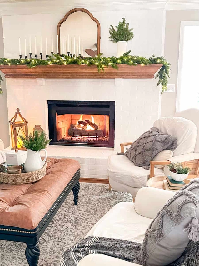 Cozy living room with fireplace and decorated mantel
