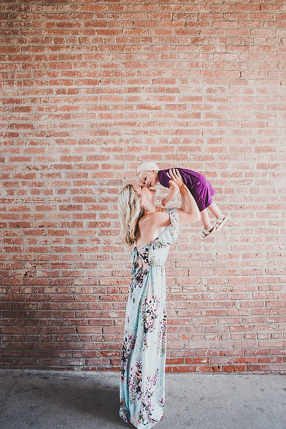 joyful new mom with colorful clothes