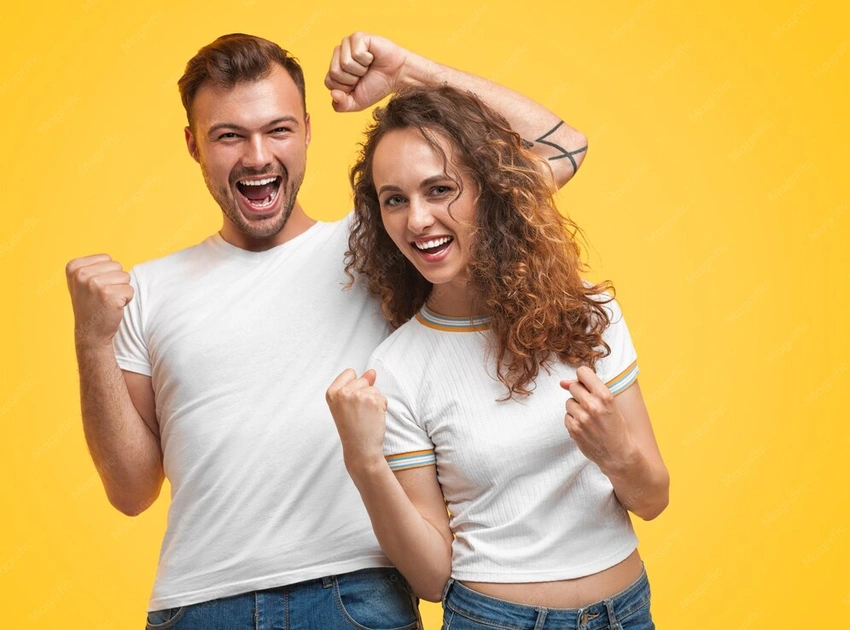 couple celebrating small victory, happy girlfriend proud boyfriend