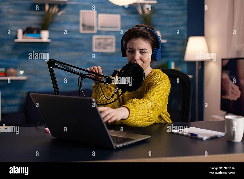 Woman with headphones talking, creative writing social media