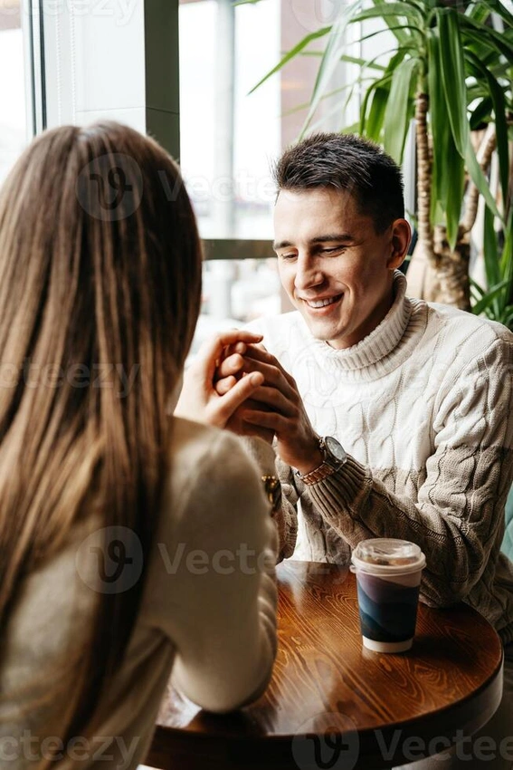 Thoughtful person smiling, deep conversation, cozy cafe