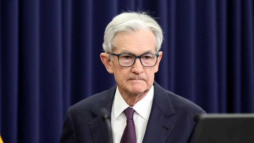 Fed Holds Rates Steady as Economy Improves, Sparks Talk of Later Cuts