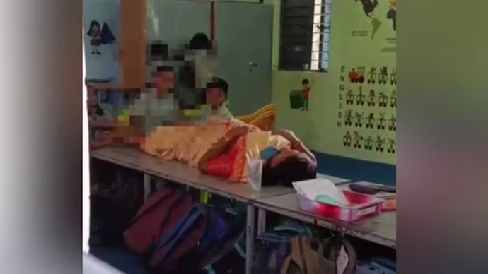 AP teacher suspended for forcing students to massage her legs in class