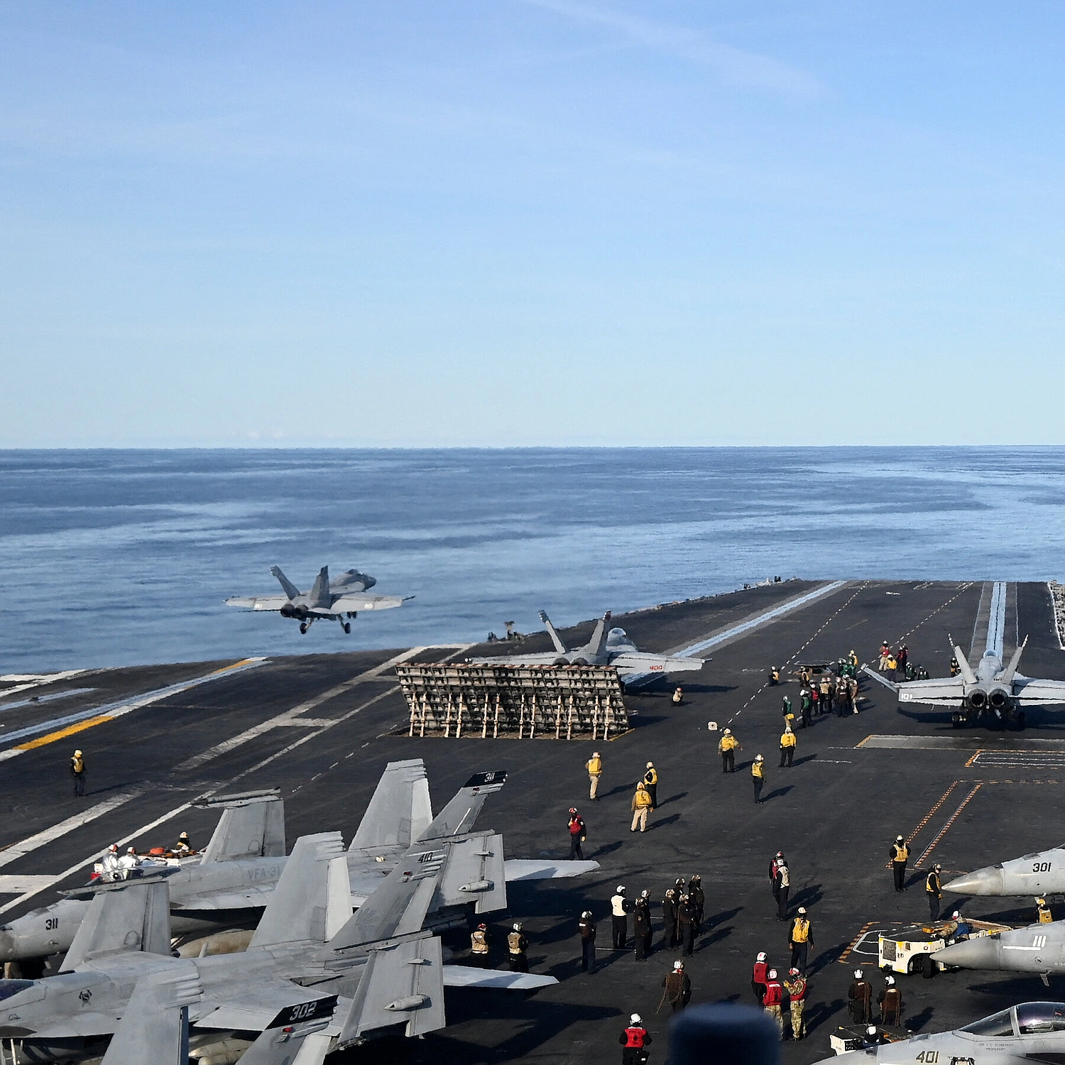 US builds forces near Iran as Tehran warns and drills intensify
