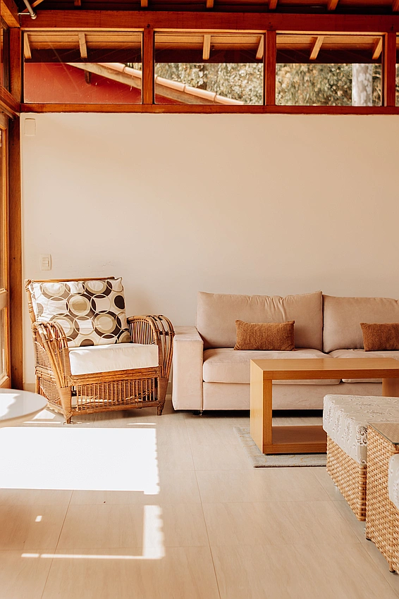 Pexels photo: bright, airy living room with rattan furniture and modern textiles