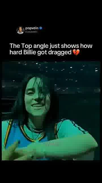 Billie gets pulled: 

The top angle captures the chaotic moment a fan grabs Billie Eilish.

#BillieE