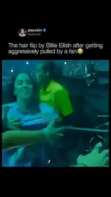 Billie’s unexpected hair flip: 

Billie Eilish reacts after a fan suddenly pulls her during the mome