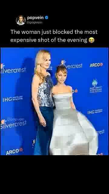Ariana’s sweet gesture: 

Ariana Grande kisses Nicole Kidman’s hand in a playful celebrity moment.

